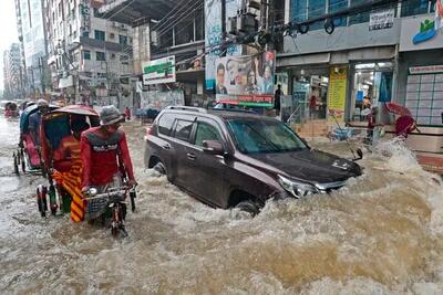 vehicles wading through water